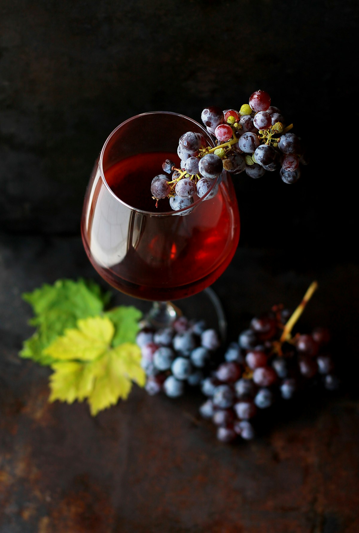A golden glass of sweet dessert wine with warm amber tones